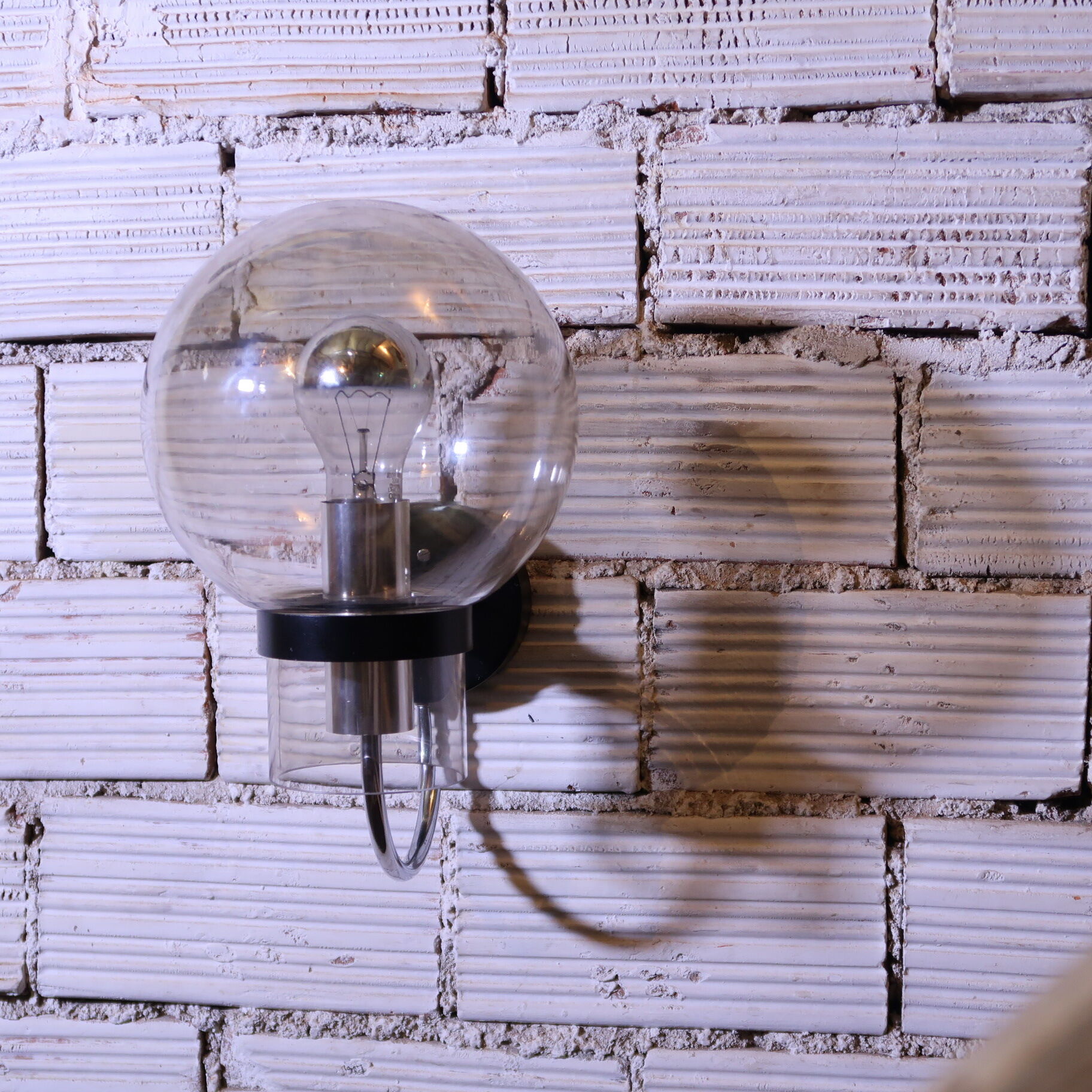 Minimalist wall lamp by Limburg in blown glass, 1970