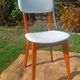 vintage wooden chairs with white faux leather