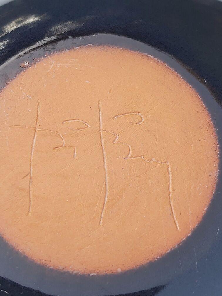 Signed ceramic flower-picker ball