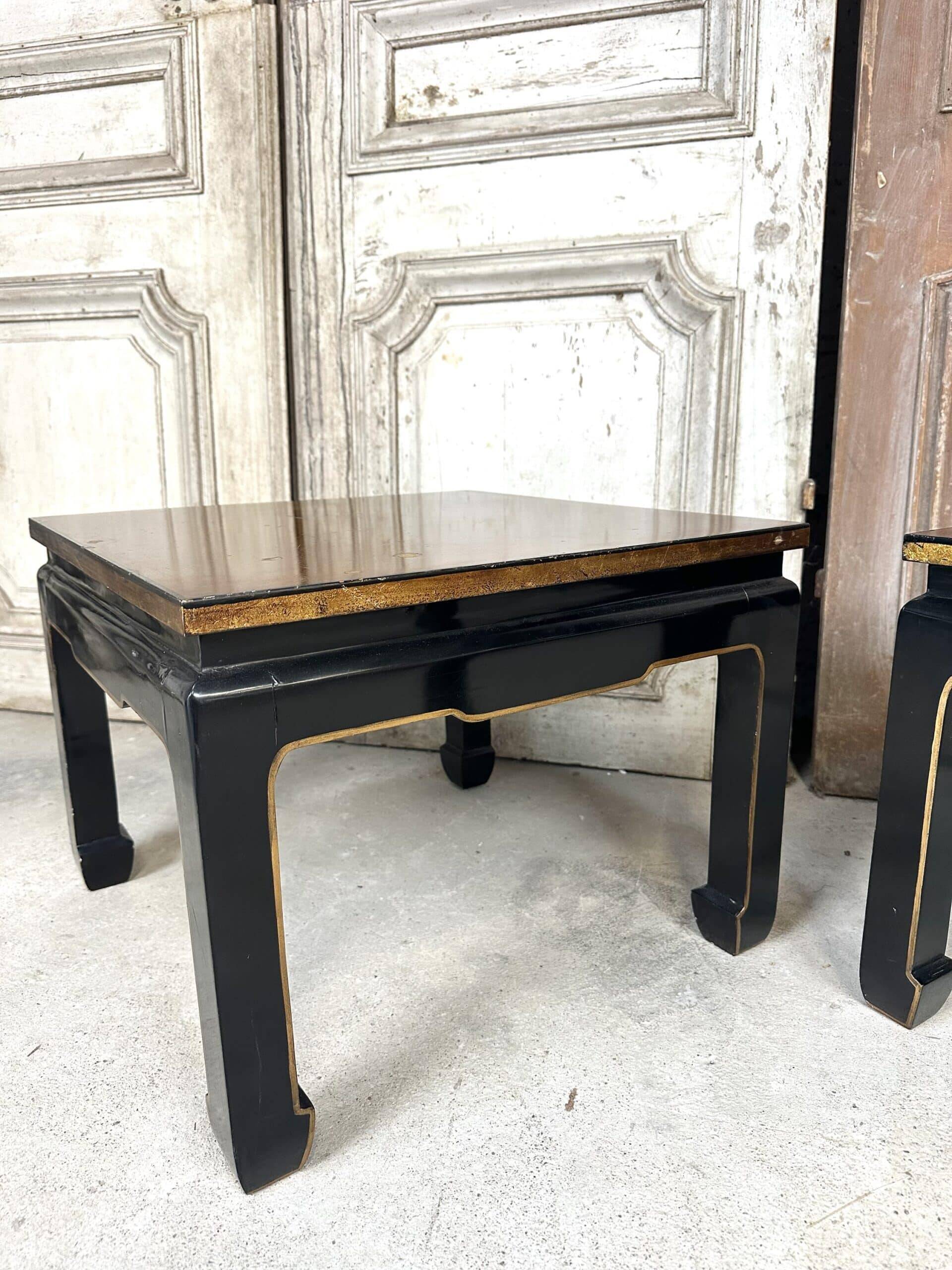 Pair of side tables in black and gold lacquer