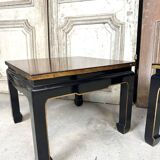 Pair of side tables in black and gold lacquer