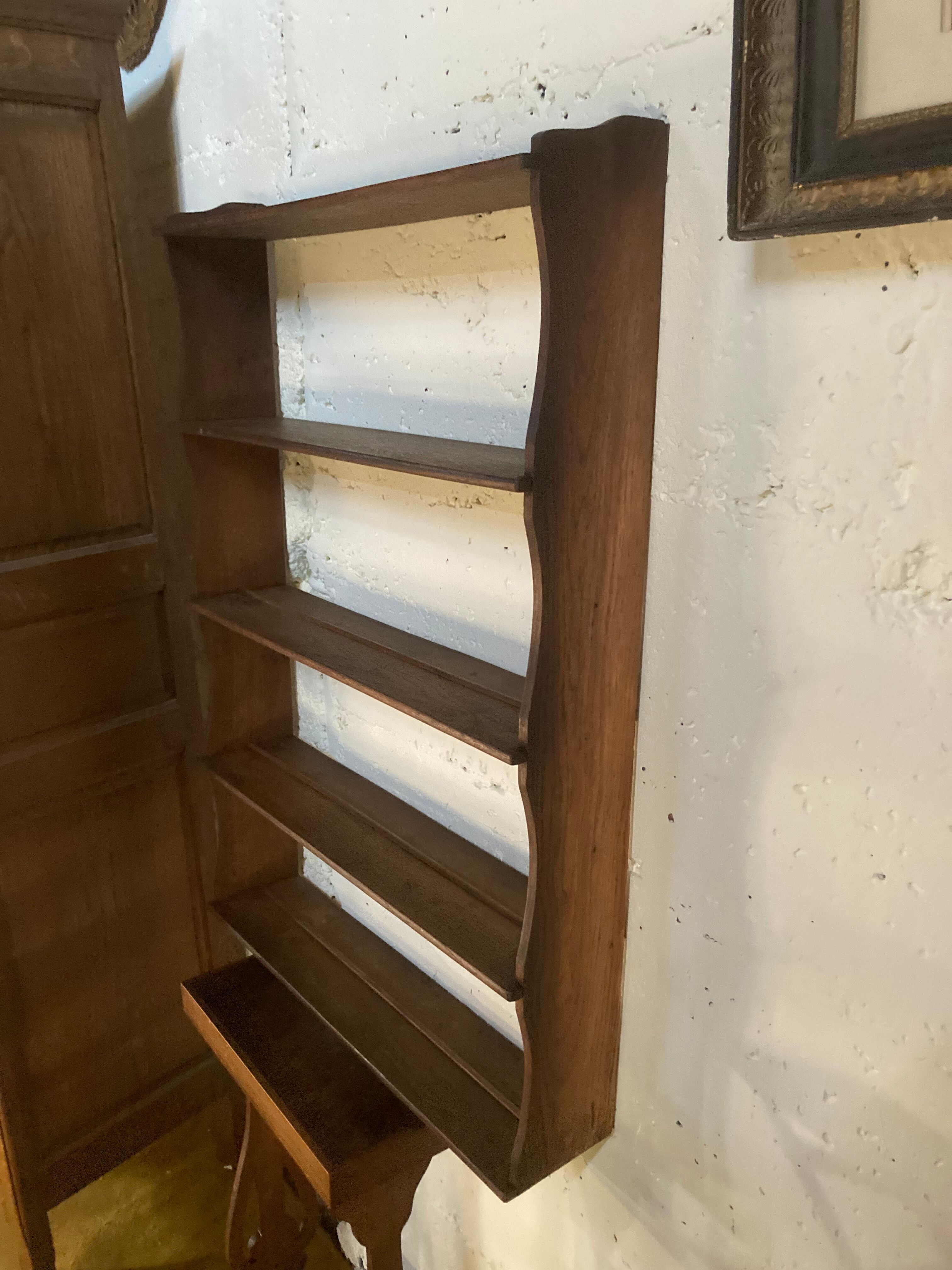 Hanging shelf for dishes