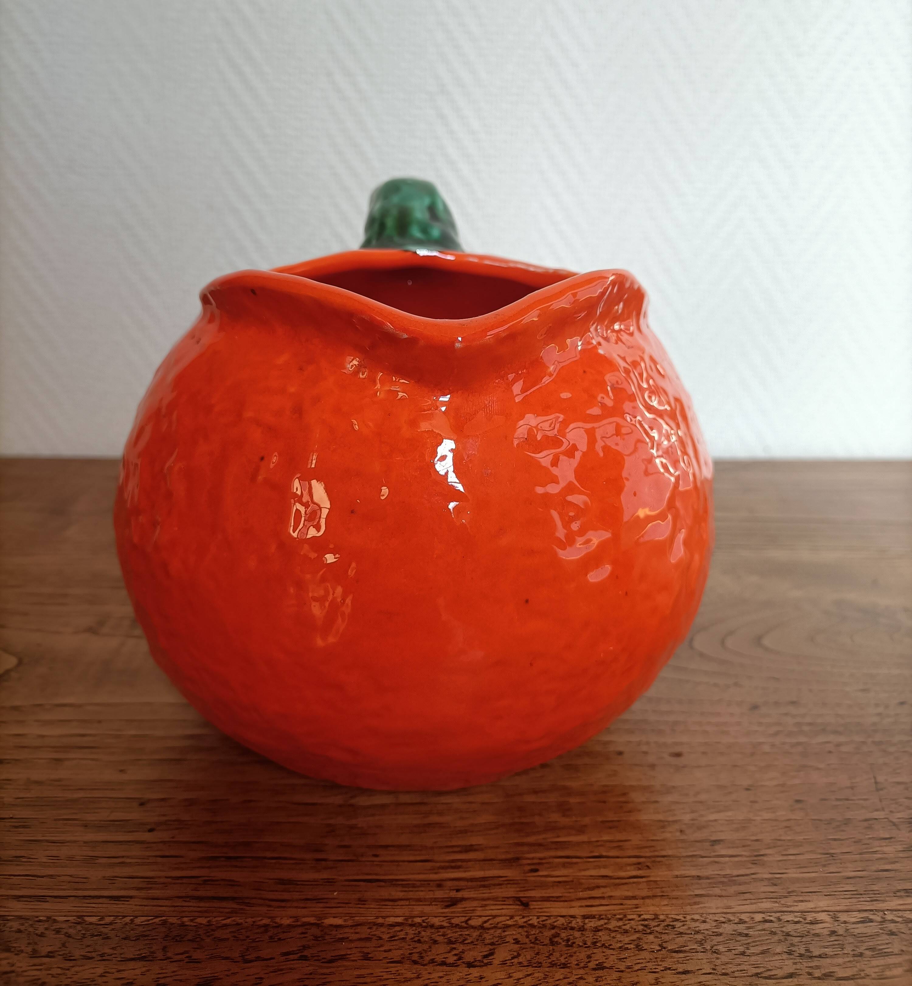 Orange pitcher in Corsican slip