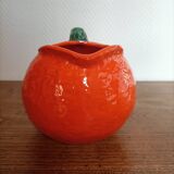 Orange pitcher in Corsican slip