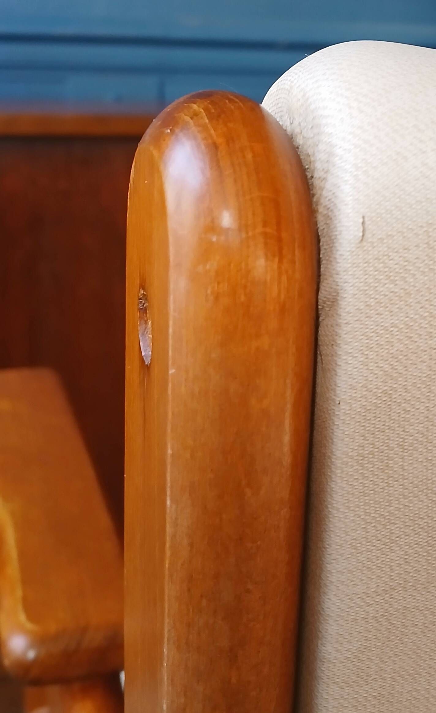 Armchair by André Sornay, stained solid beech & beige faux leather. 1980