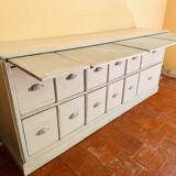 Solid wood sideboard with drawers.