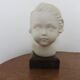 Bust " child in plaster