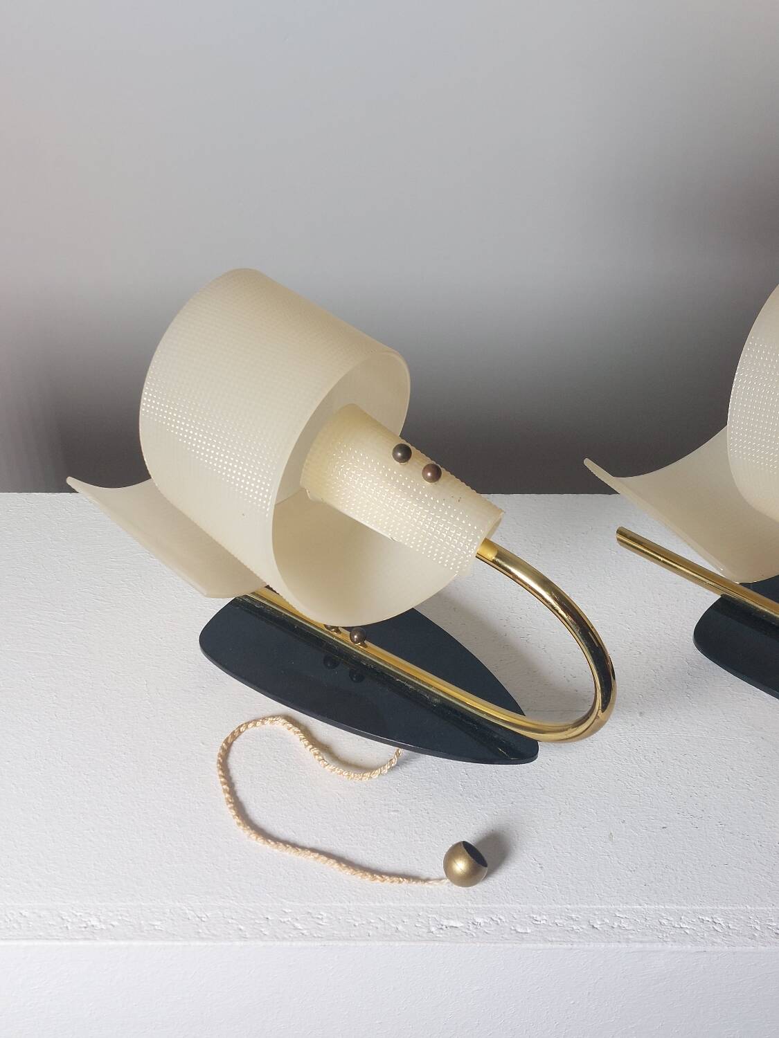 Pair of vintage wall lamps from the 1950s in brass.