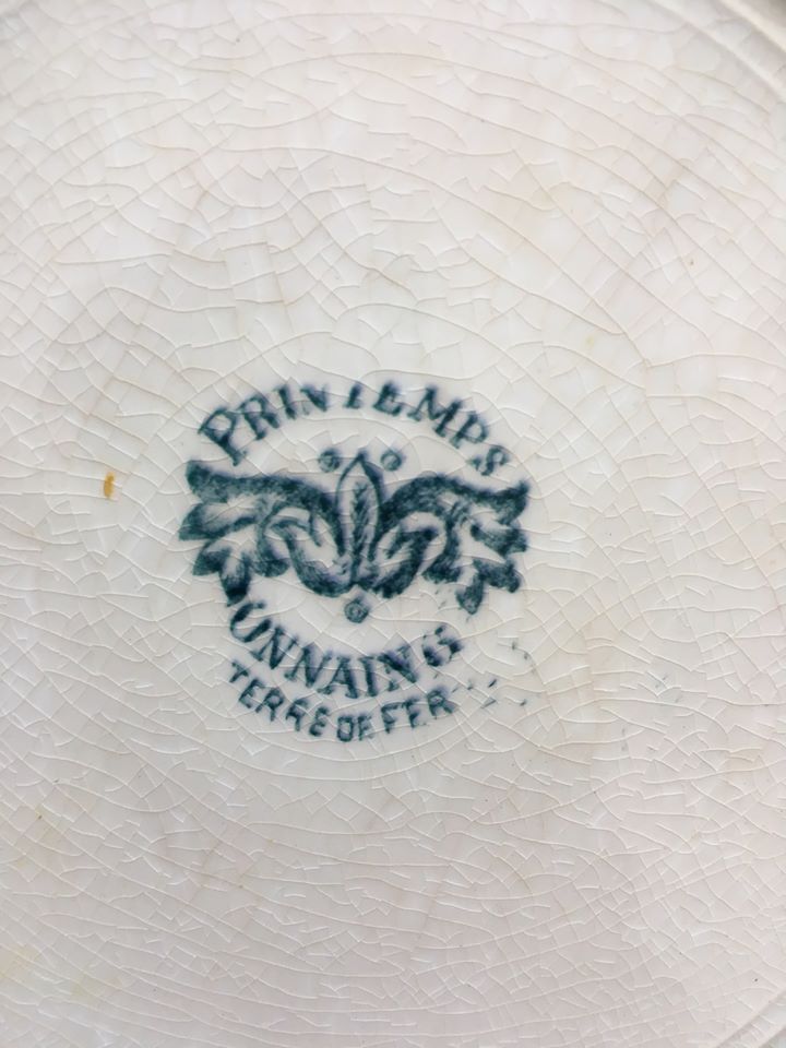 Together six dinner plates old mismatched bluish green.