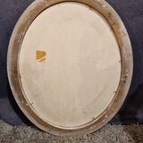 Golden oval frame