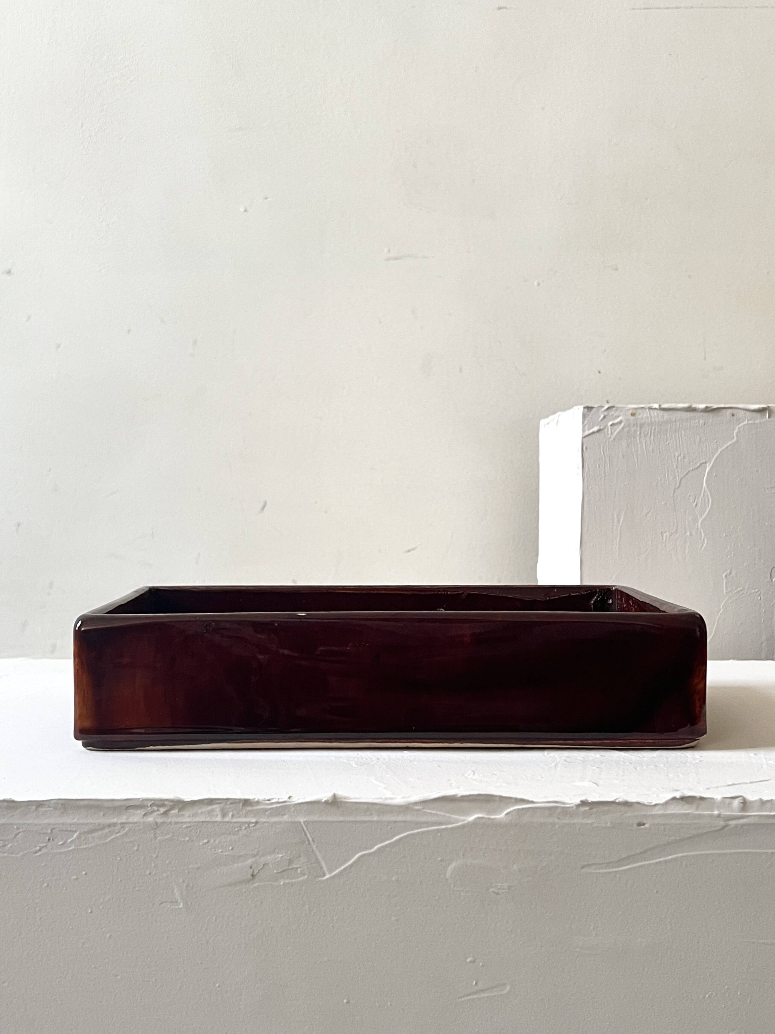 Bordeaux ceramic enamelled vide poche by Dutch artist A. Reuver, numbered.