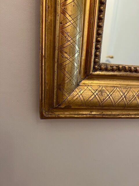 Old mirror Louis-Philippe in gilded wood