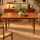 Vintage Scandinavian teak dining table 1970s – 2 integrated extensions