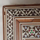 Wood cigarette box and mother-of-pearl inclusion