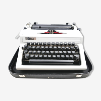 Erika 100 vintage collector's typewriter revised with its leather suitcase