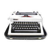 Erika 100 vintage collector's typewriter revised with its leather suitcase