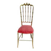 Designer Chiavari chair in polished brass.