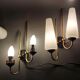 Pair of sconces in black metal and gilded brass 1960 Vintage.