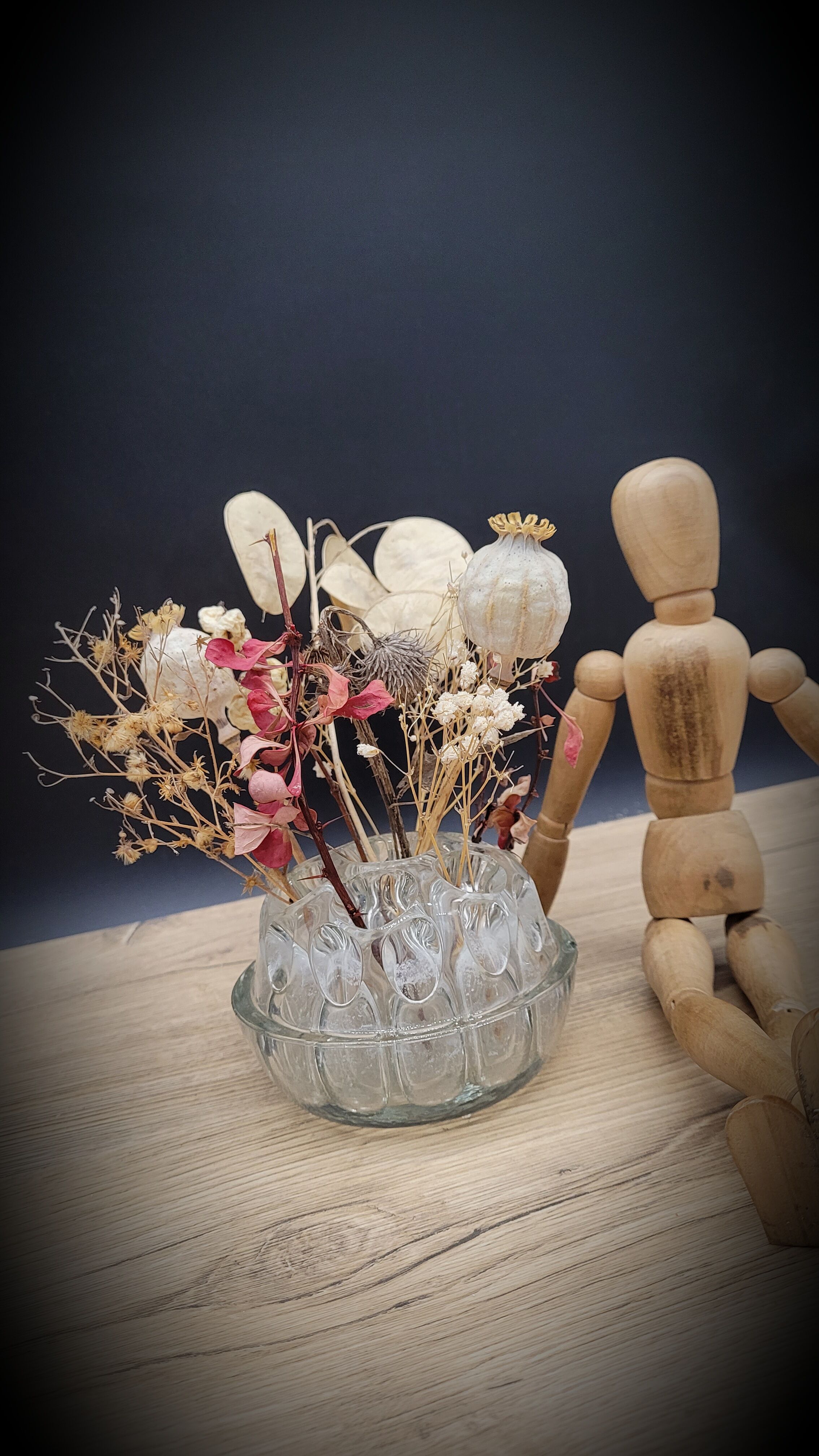 Pique flowers in glass of Reims