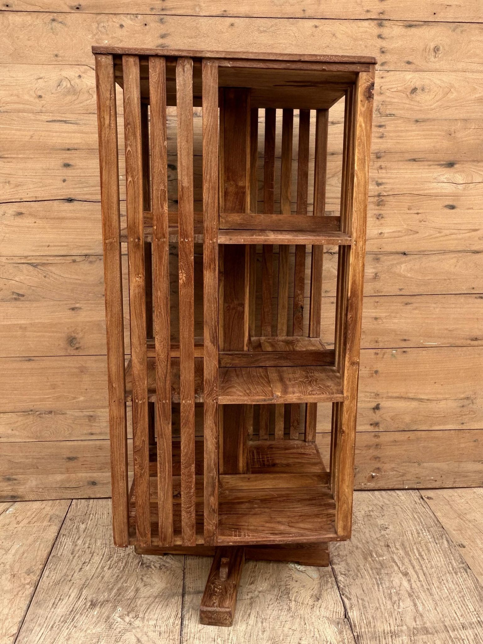 rotating library in Burmese teak