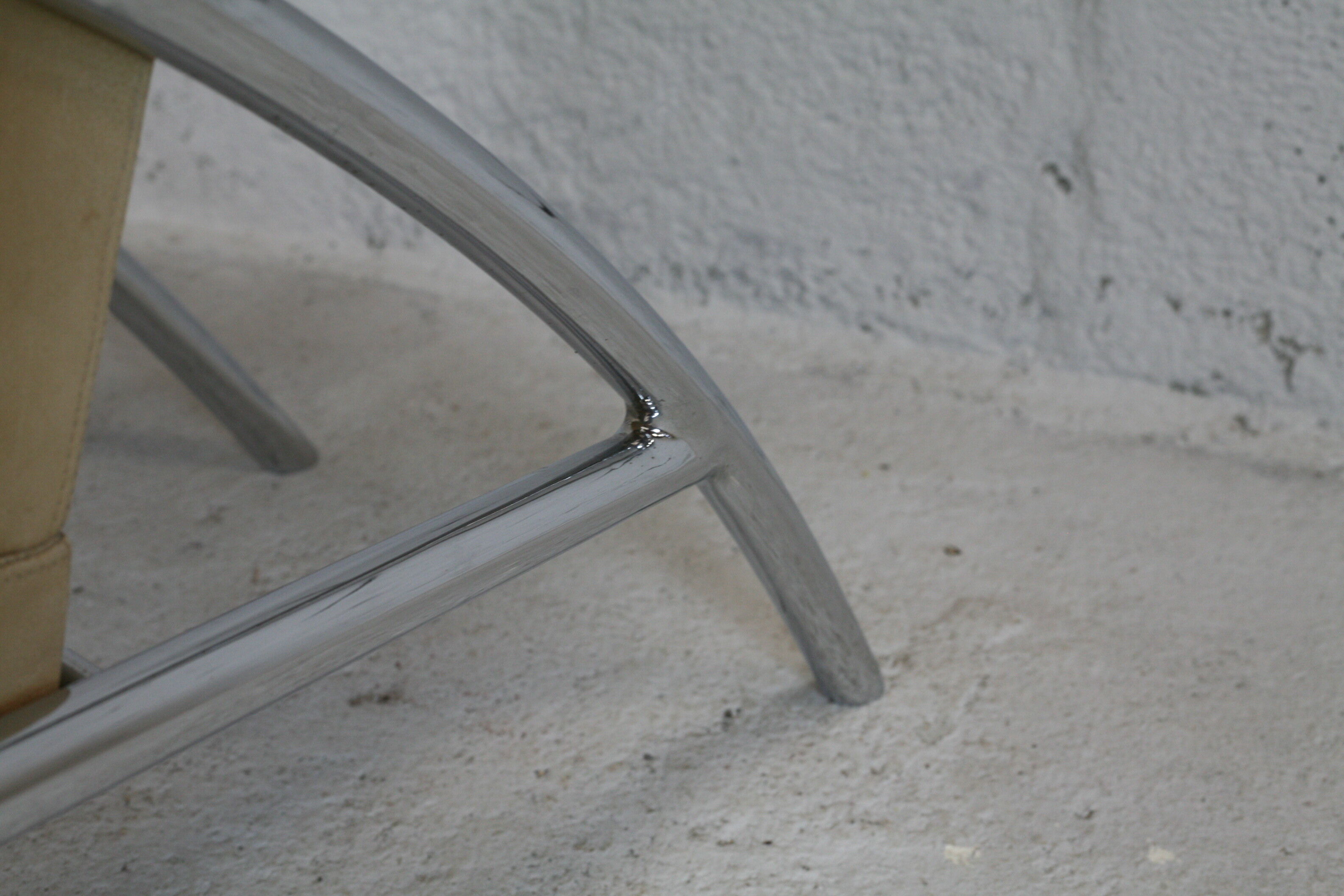 Tubular steel armchair and "cream" leather, France, circa 1970