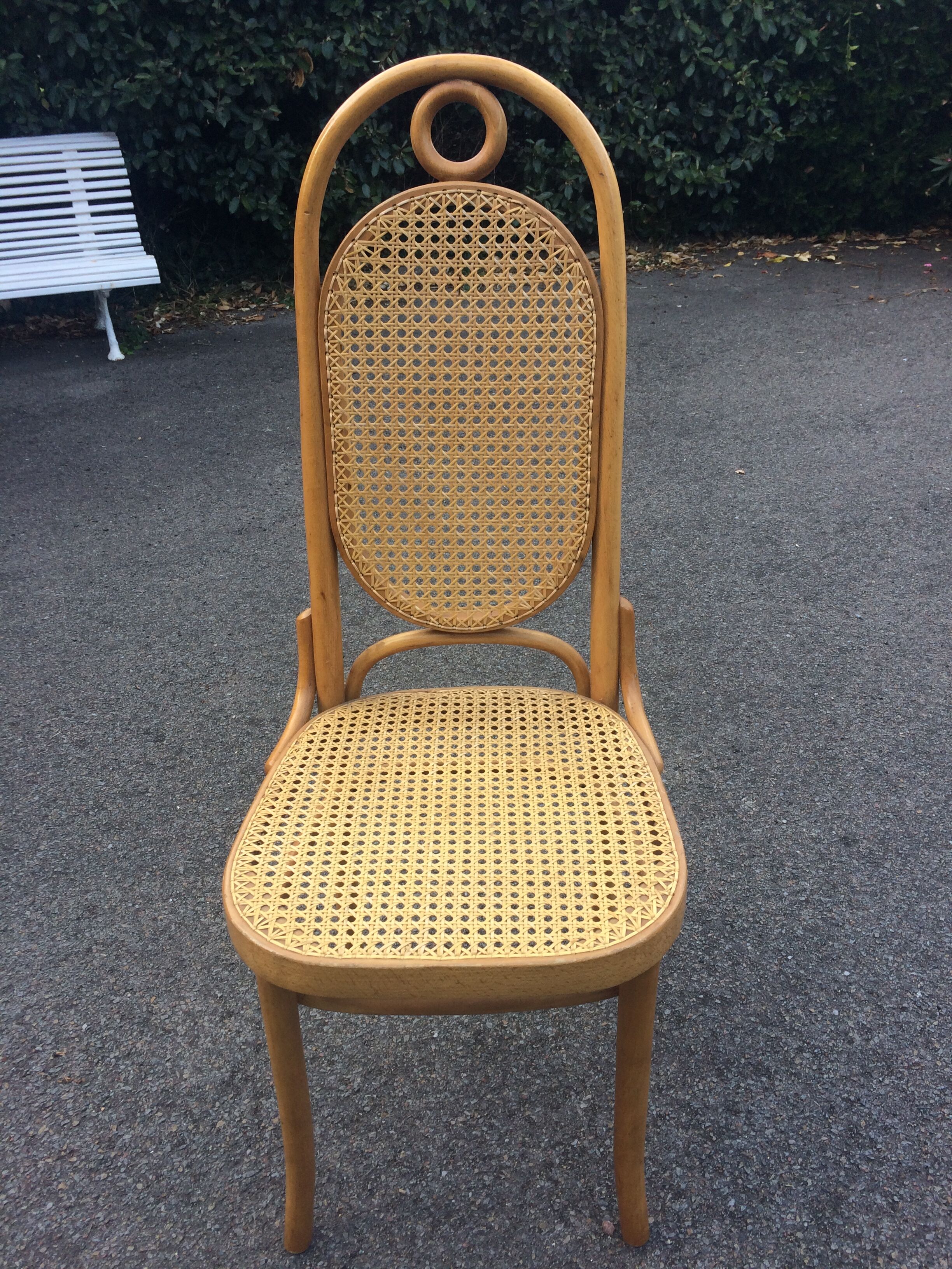 2 light wooden chairs. , seated and fluted backrest. Thonet No 17?