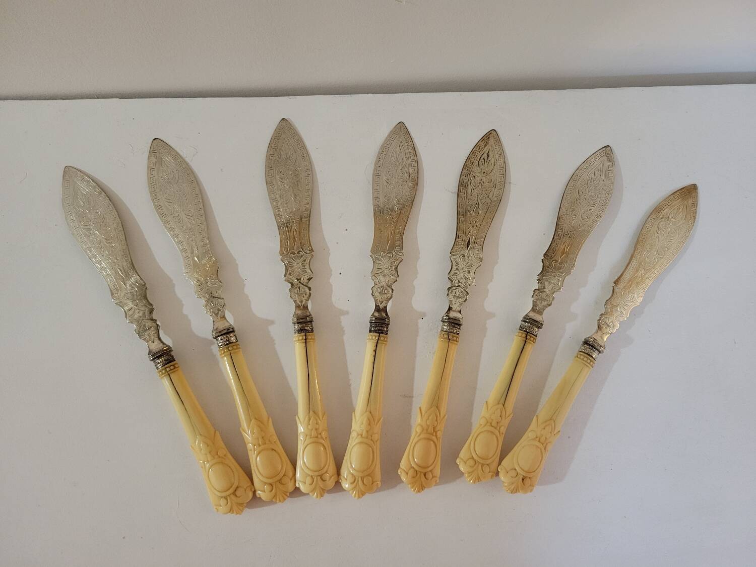 English fish knives in silver and ivory, 19th century