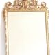 Miroir doré XXe style Louis XVI