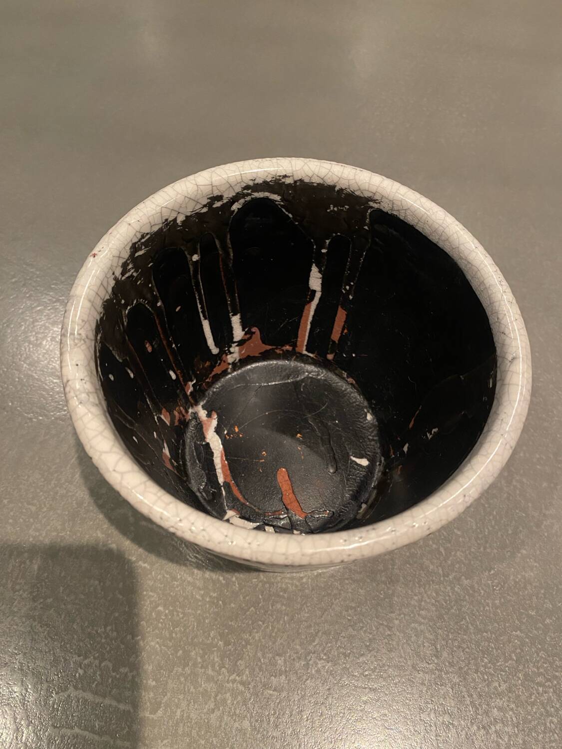 Enamelled earthenware pot