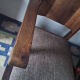 Antique arts and crafts carved oak armchair, 1910