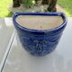 Wall pot in glazed blue terracotta with a grape design, 1970s.