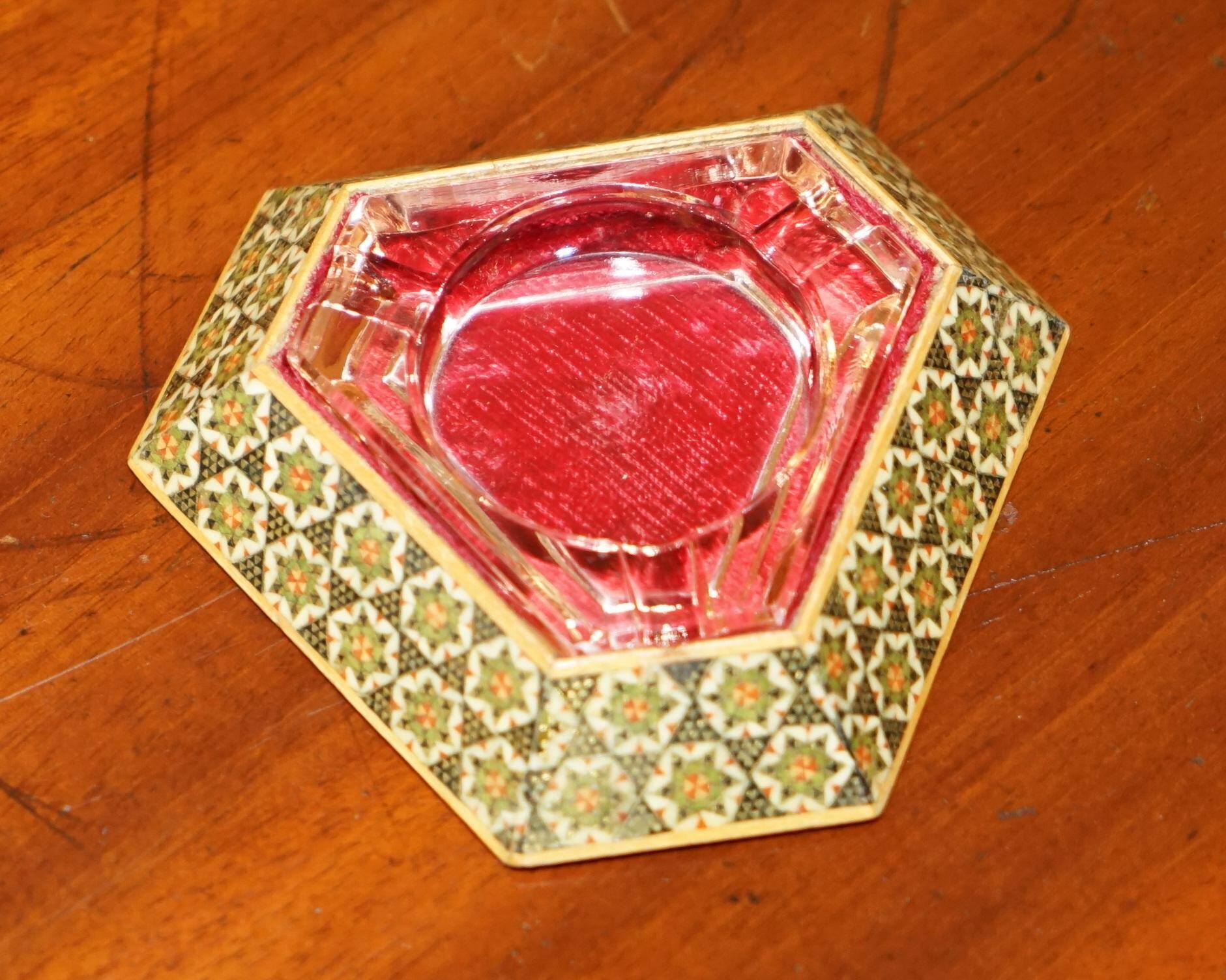Antique Persian ashtray with triangular glass tray.