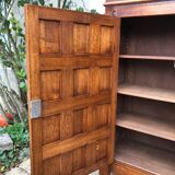 Spanish furniture with carved wood profiles and coats of arms from the 1950s.