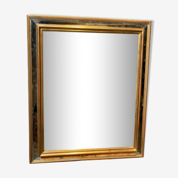 Beveled mirror in gold metal