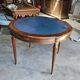 Elegant game table or circular extending side table in Louis XVI style.