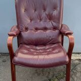 Scandinavian armchair with footrest