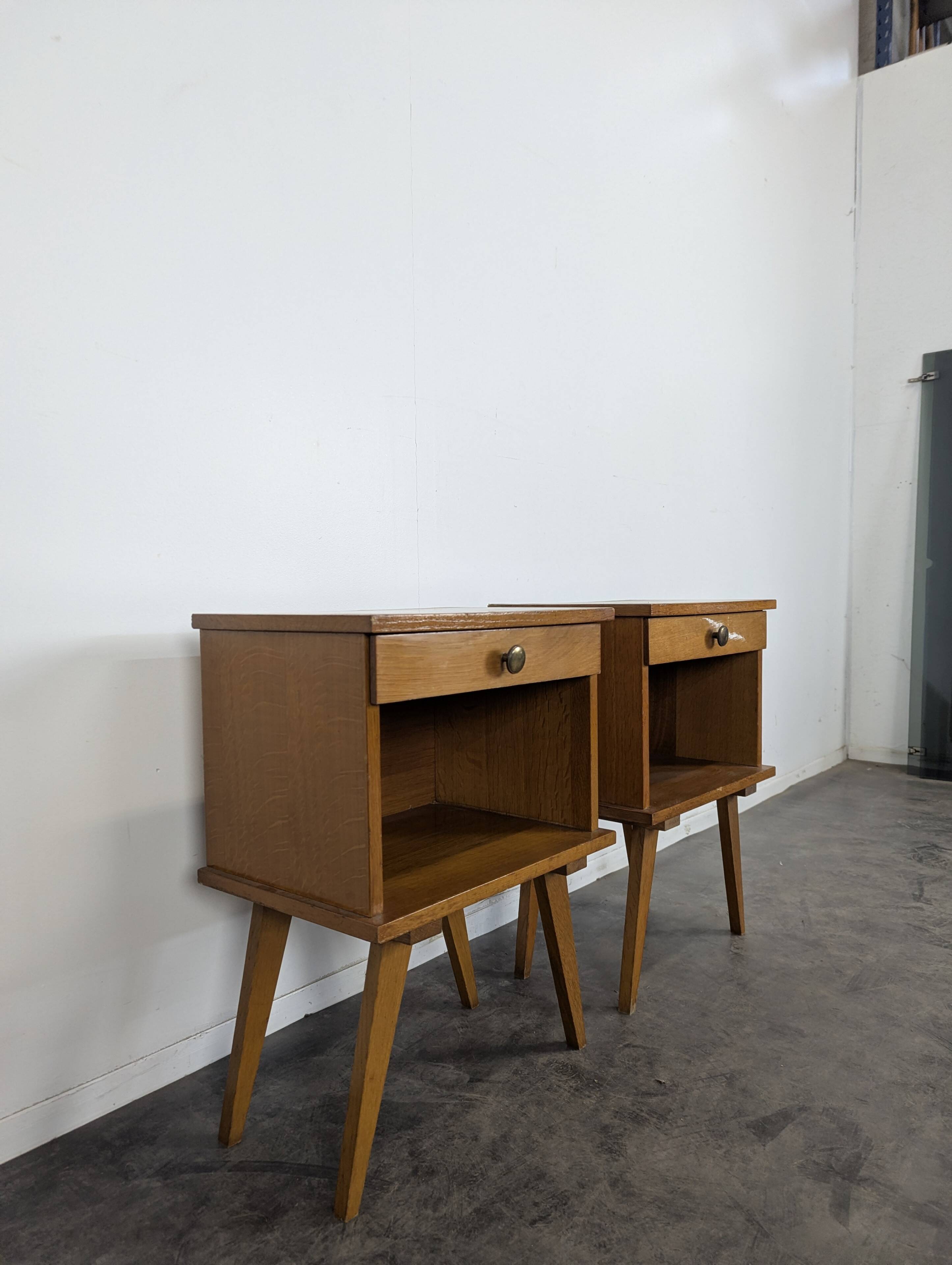 Pair of bedside tables from the 1940s Reconstruction period.