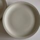 Set of 7 Scandinavian modernist flat plates in ivory earthenware