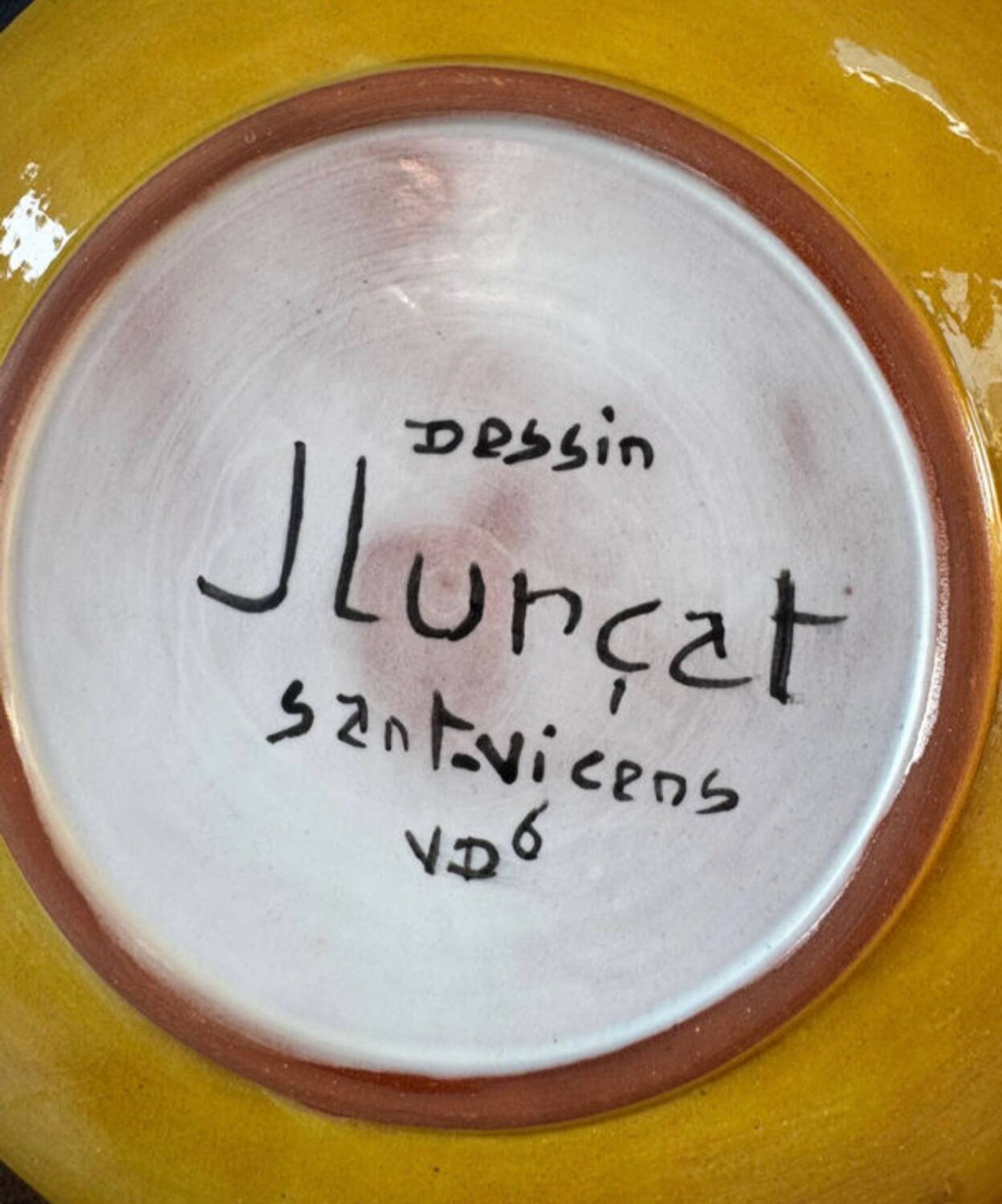 Terracotta plate, Jean Lurçat decorated with a rooster and foliage.