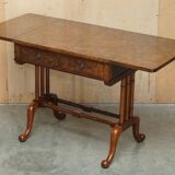 Antique extendable coffee table circa 1880 in solid walnut.