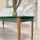 Vintage farm table with spindle legs.