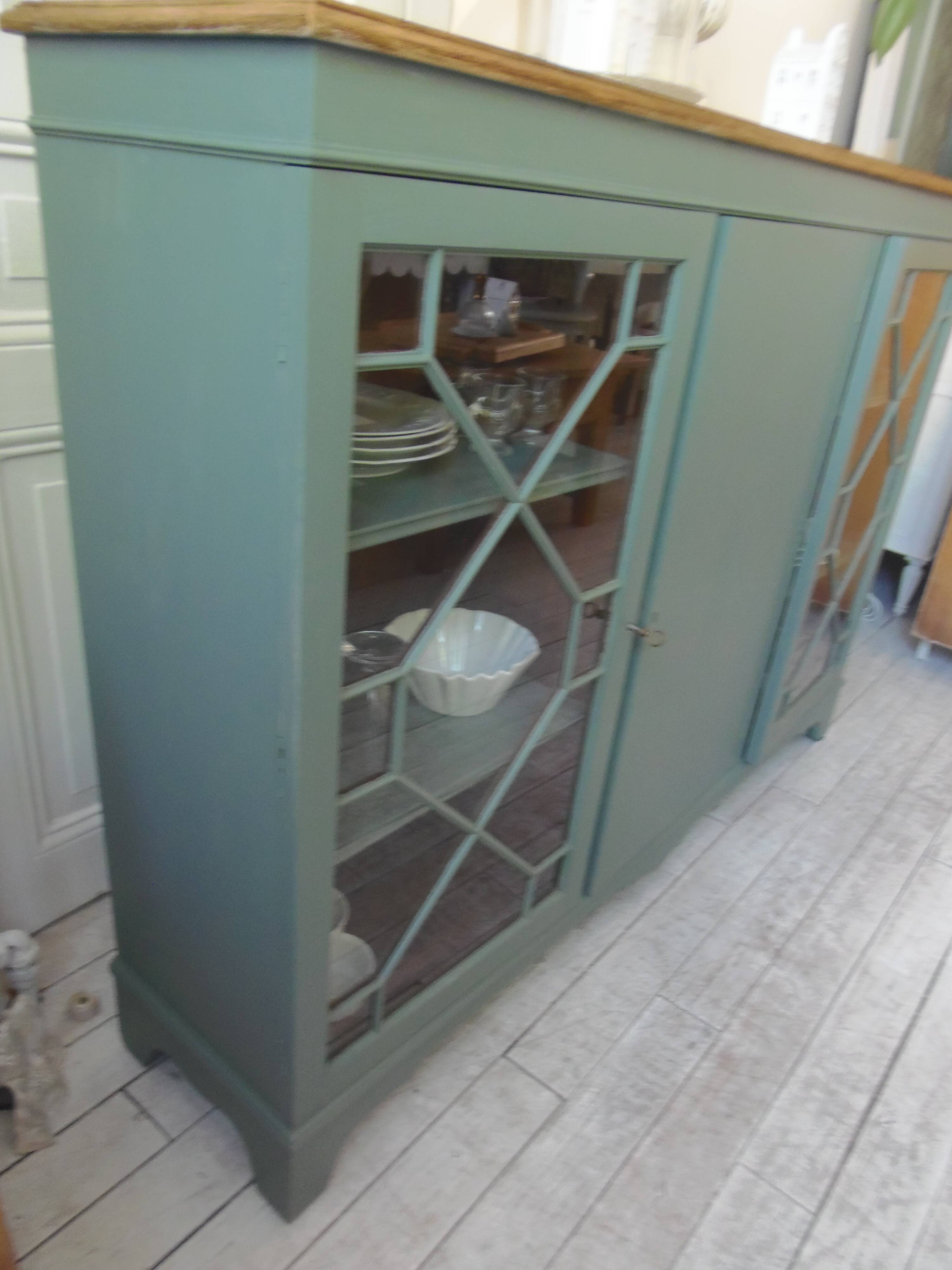 English sideboard, shallow, smoky green, wooden top.