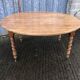 Round table in solid cherry wood, extendable with twisted legs, Louis Philippe style.