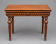 Table in Henri II style game console.