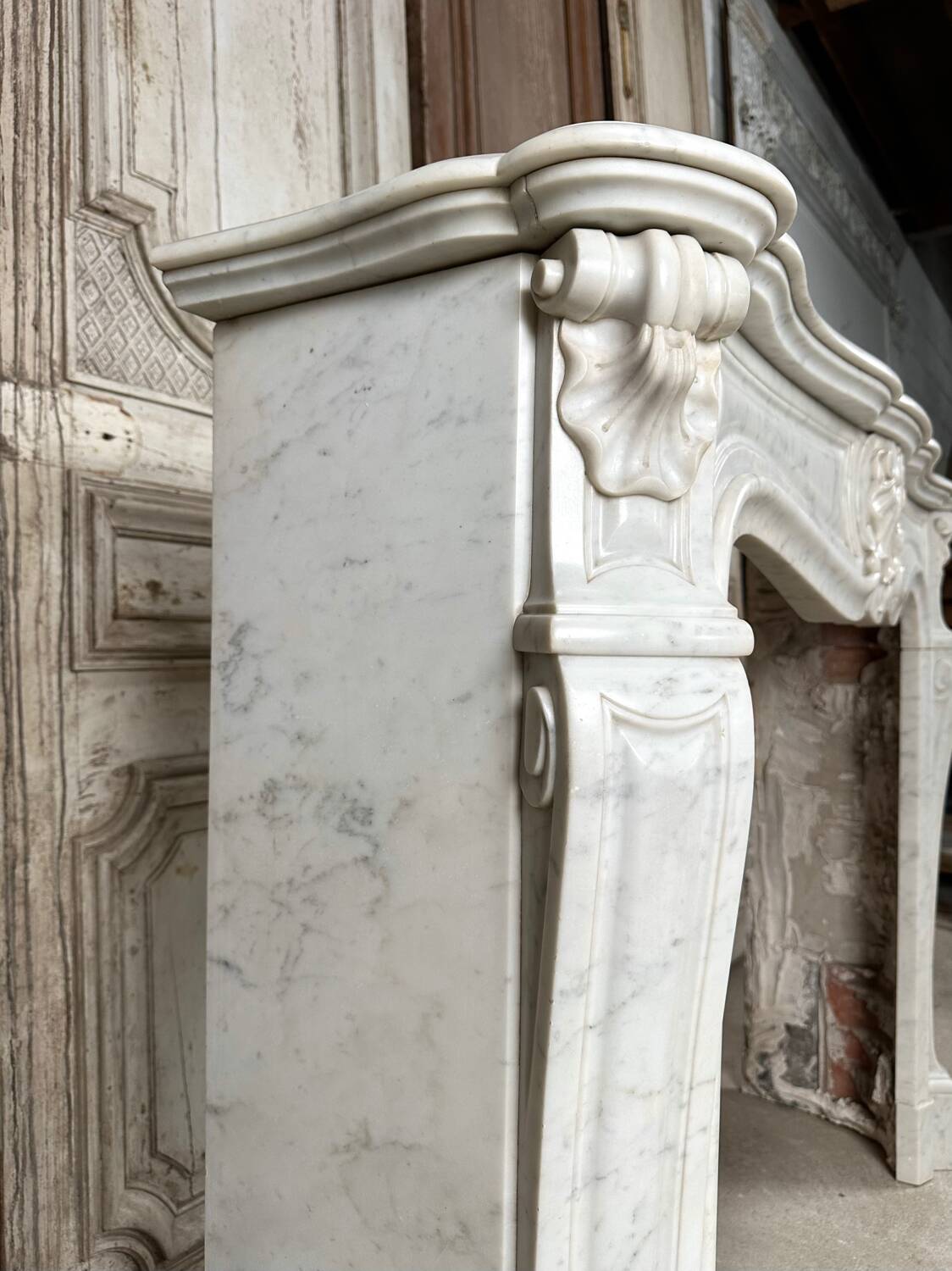 Louis XV style fireplace in white marble