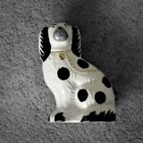 Vintage ceramic figurine from Staffordshire depicting a spaniel dog, England.