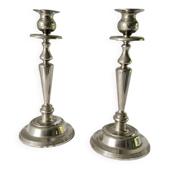 Pair of silver metal candlesticks