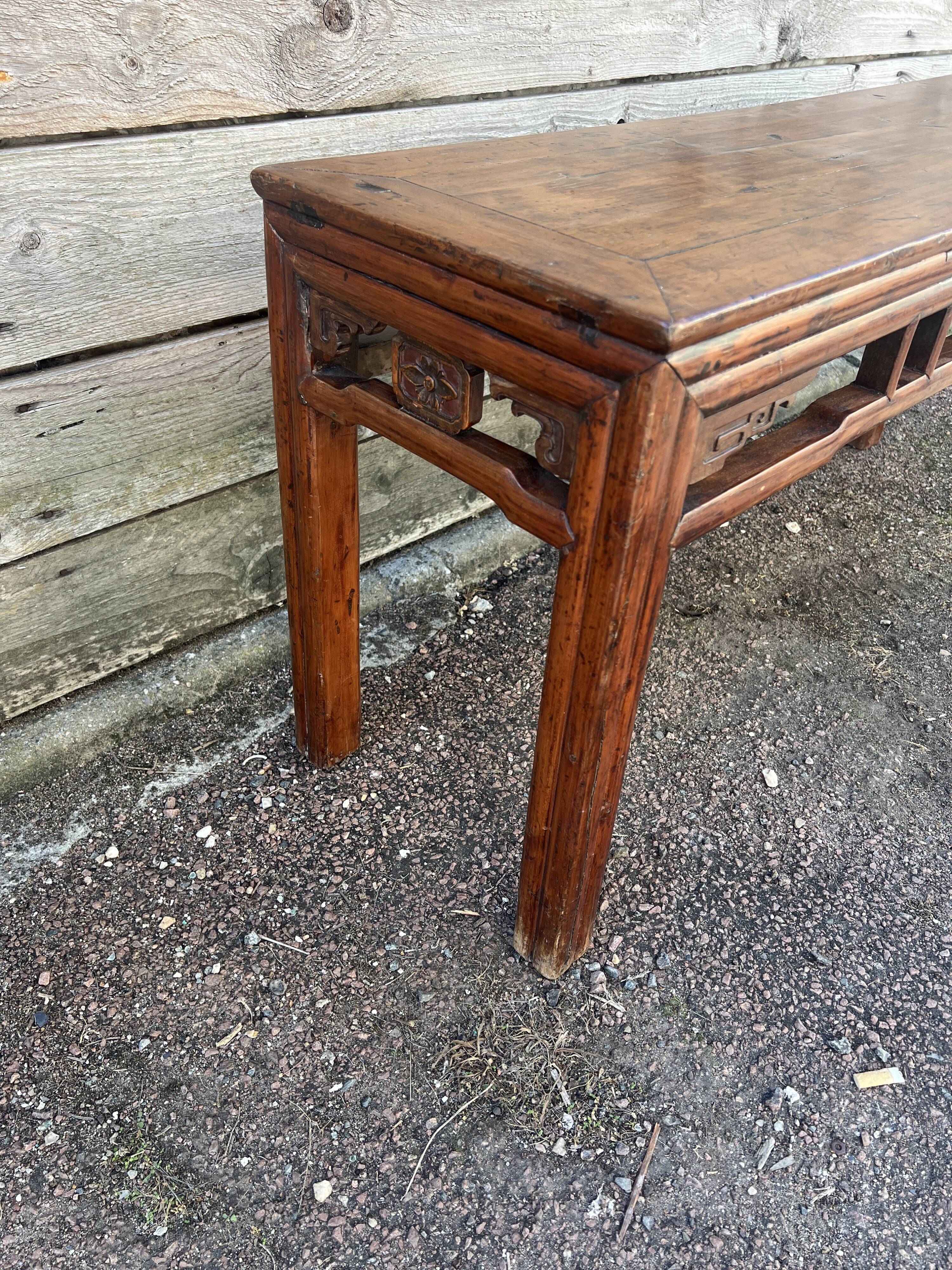 Asian low console in natural wood