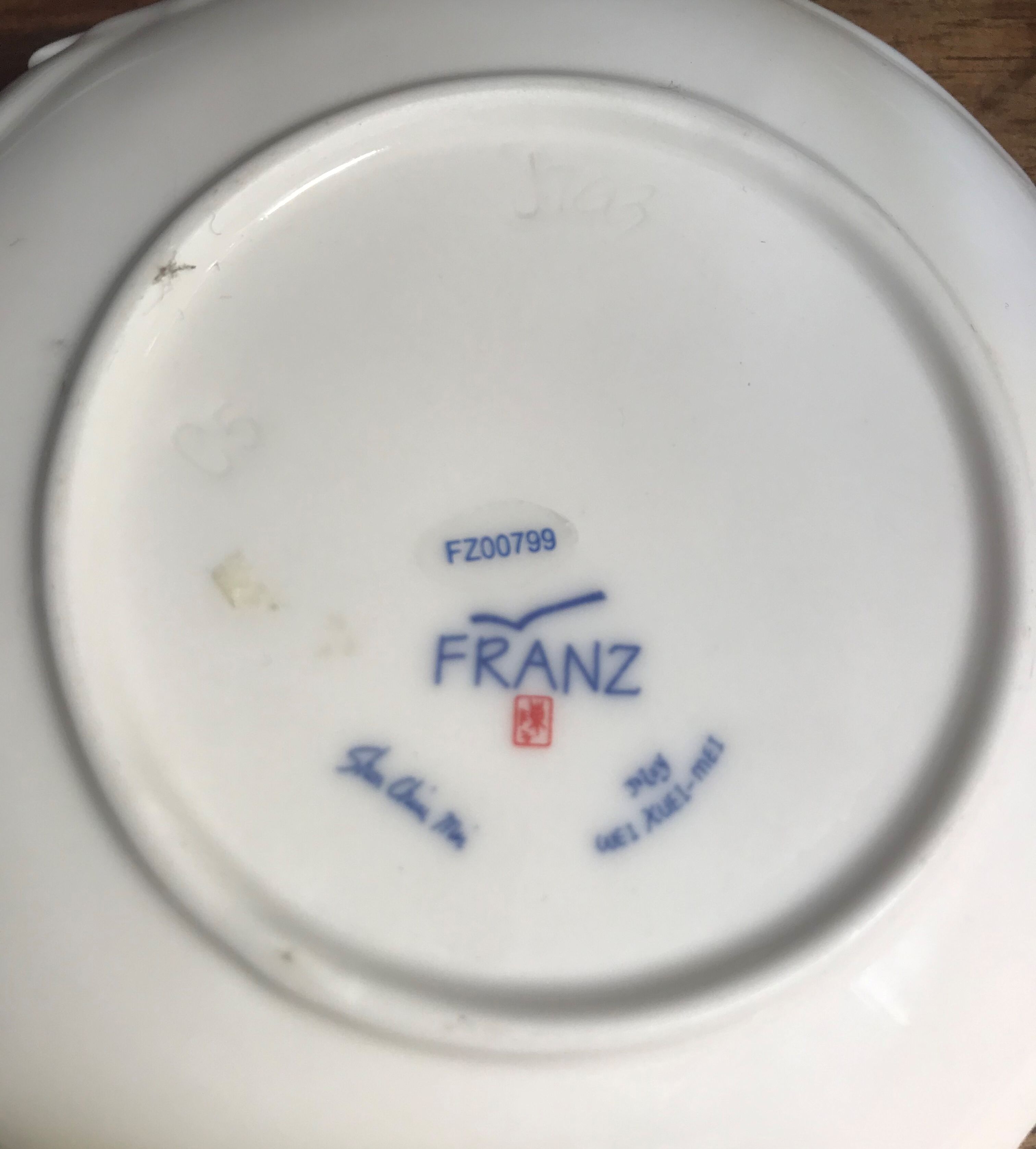 Coffee cup with its under cup, Franz porcelain