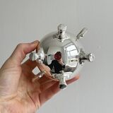 Antique shiny metal sugar bowl